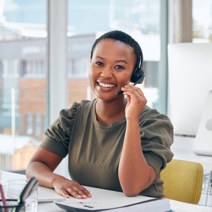 professional woman wearing headset on a call