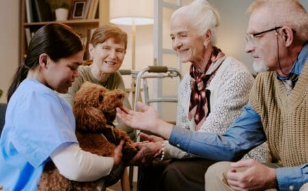 A therapy dog training at a nursing home.